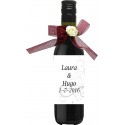 Vin personnalisé pour mariage décoré avec un ruban et une fleur