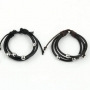 Bracelet noir ajustable avec billes métalliques