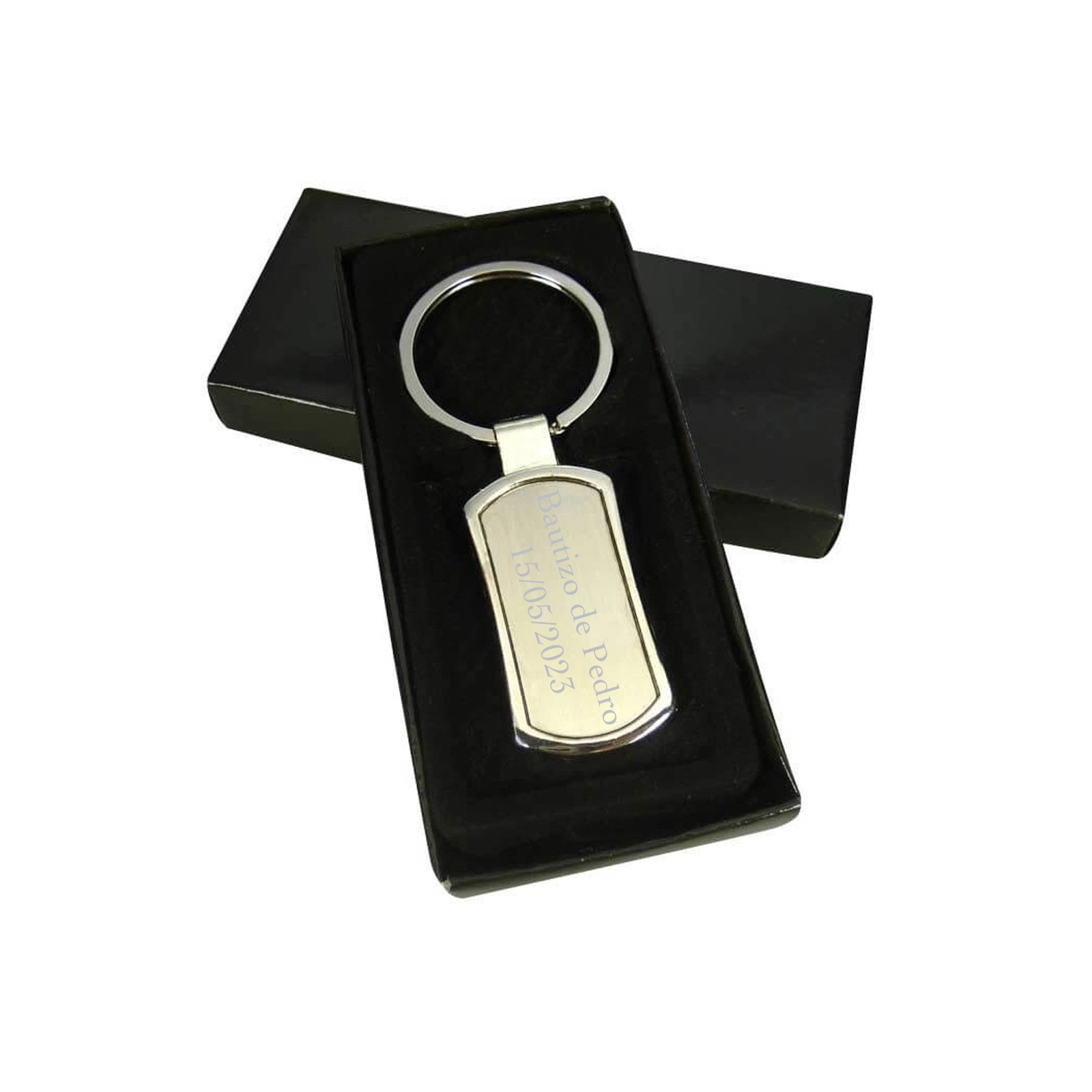 Porte clés en argent gravé au laser présenté dans une boîte