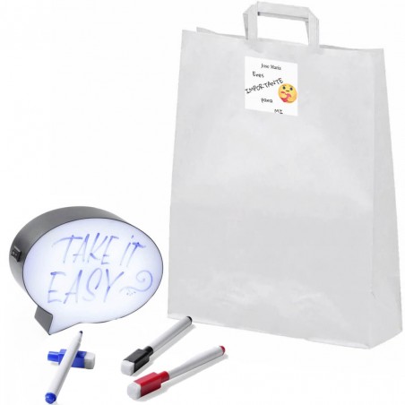 Tableau blanc avec lumière présenté dans un sac cadeau...