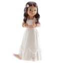 Figure de gâteau fille brune avec veste rose et baskets de sport