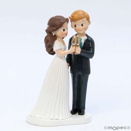 Figure de gâteau de mariage des mariés trinquant