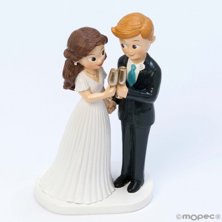 Figure de gâteau de mariage des mariés trinquant
