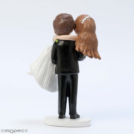 Figurine de gâteau de mariage marié dans les bras de la mariée