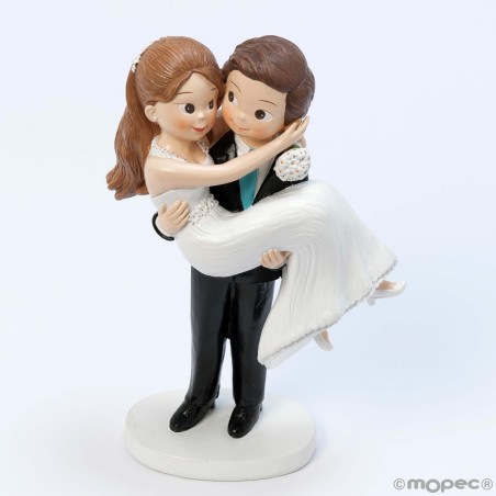 Figurine de gâteau de mariage marié dans les bras de la mariée