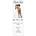 Marque-page avec le nom de l'invité et une phrase de remerciement avec un stylo de mariage présenté dans un sac transparent