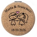 Miroir personnalisé pour mariage avec nom et date présenté dans un sac en organza rouge