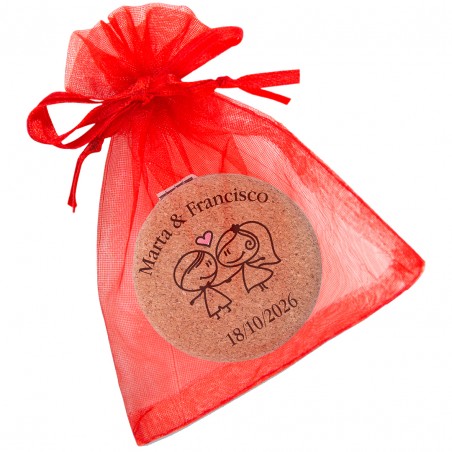 Miroir personnalisé pour mariage avec nom et date présenté dans un sac en organza rouge