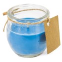Bougie parfumée colorée dans un pot en verre