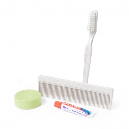 Coffret hygiène avec brosse à dents et dentifrice savon et peigne présenté dans une boîte kraft