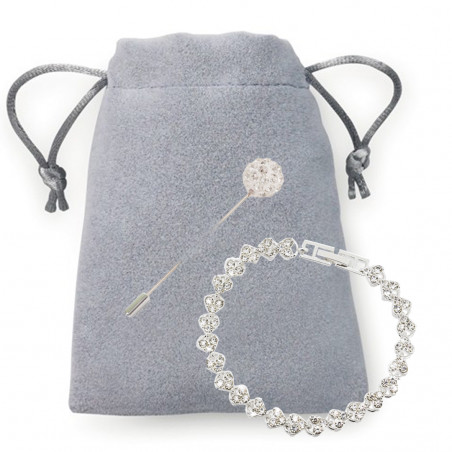 Bracelet de bijoux fins avec cristaux présenté dans un sac en daim et une épingle de mariage