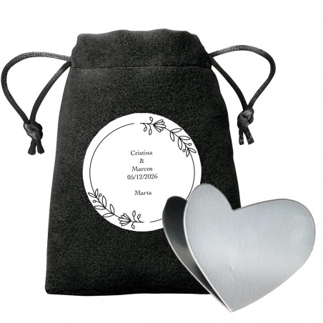 Trombone en forme de cœur dans un sac noir avec adhésif personnalisé
