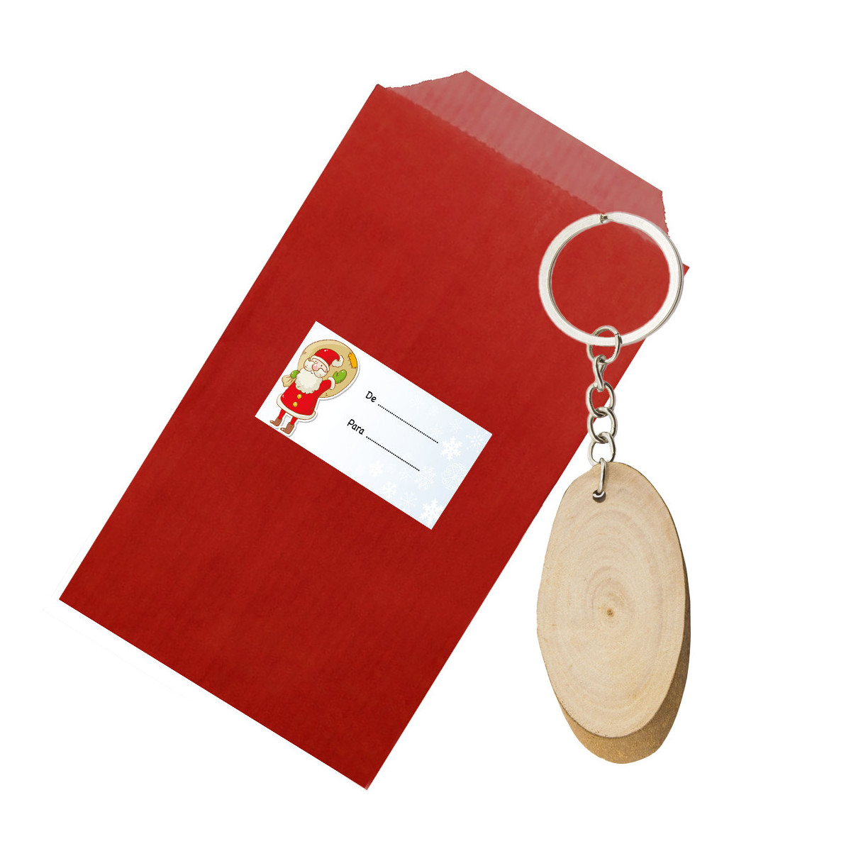 Porte-clés en bois présenté dans une enveloppe kraft rouge avec un autocollant pour Noël
