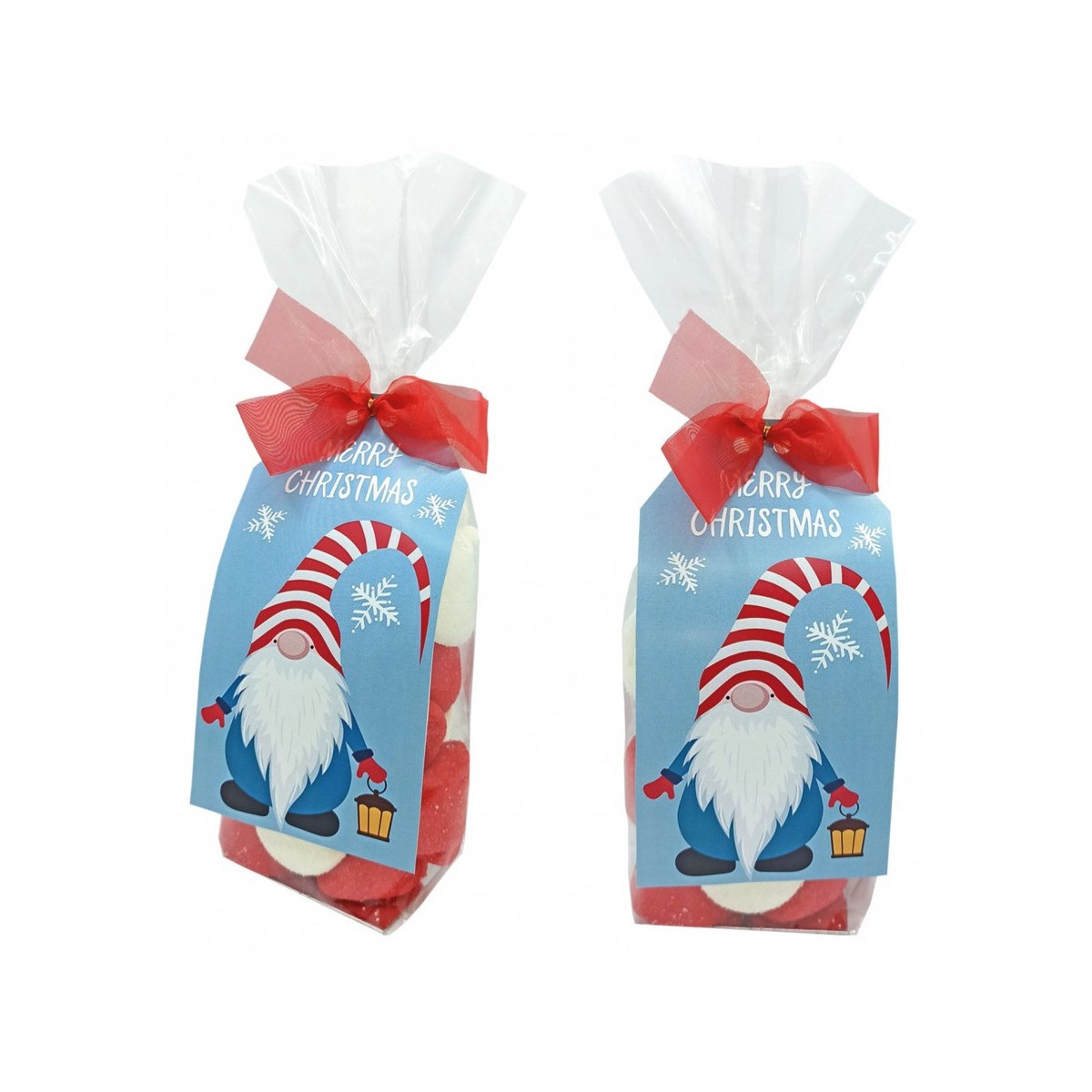 Bonbons dans un sac transparent avec carte de vœux de noël