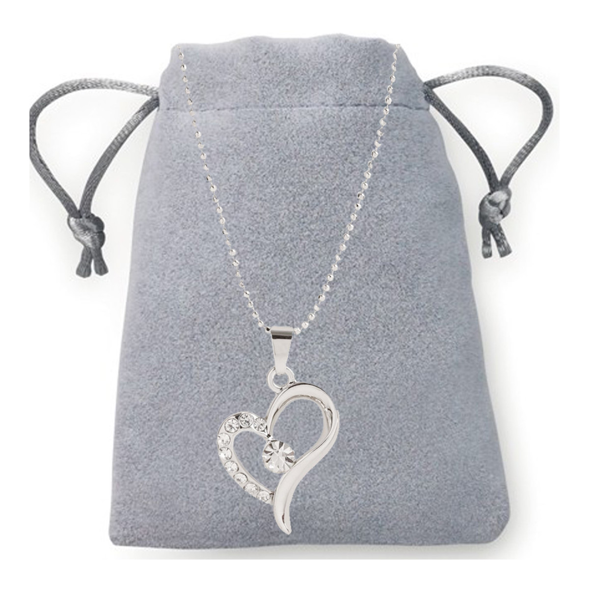 Pendentif en forme de coeur et diamants dans une pochette en daim à offrir en cadeau