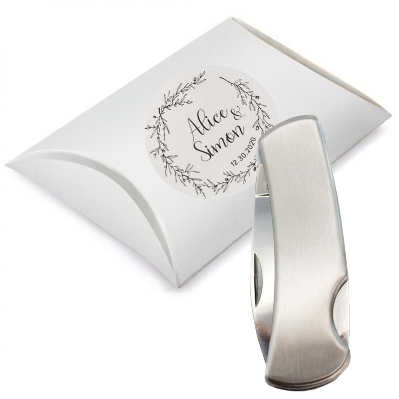 Couteau en acier inoxydable de couleur argent dans une boîte cadeau avec autocollant personnalisé pack cadeau