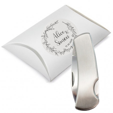 Couteau en acier inoxydable de couleur argent dans une boîte cadeau avec autocollant personnalisé pack cadeau