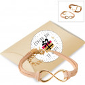 Bracelet infini avec fermeture à chaîne dans une boîte pour cadeaux secrets du père noël