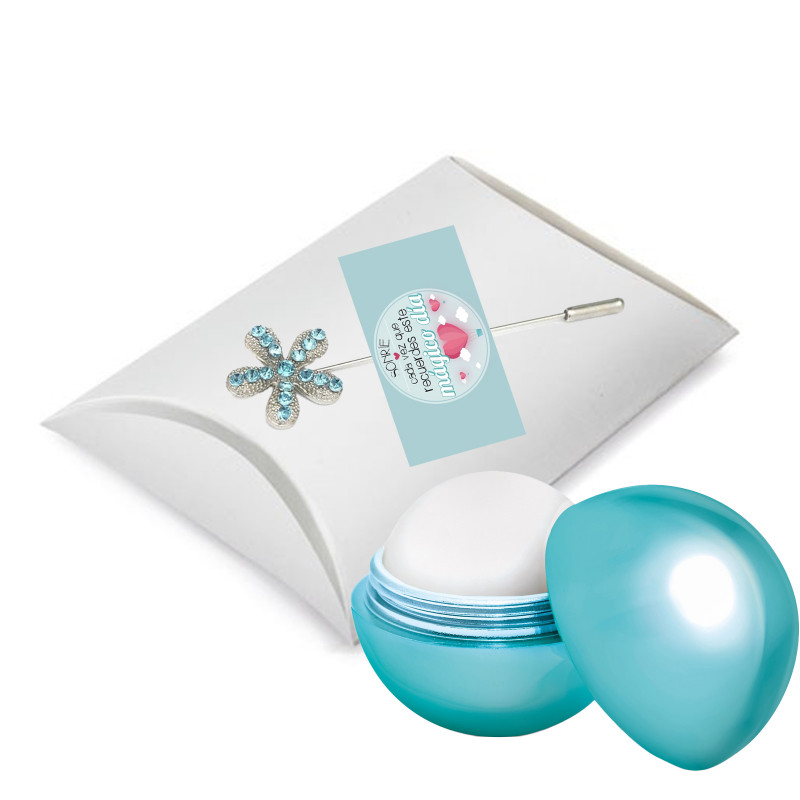 B gloss à lèvres boule dans une boîte de présentation et épingle décorative