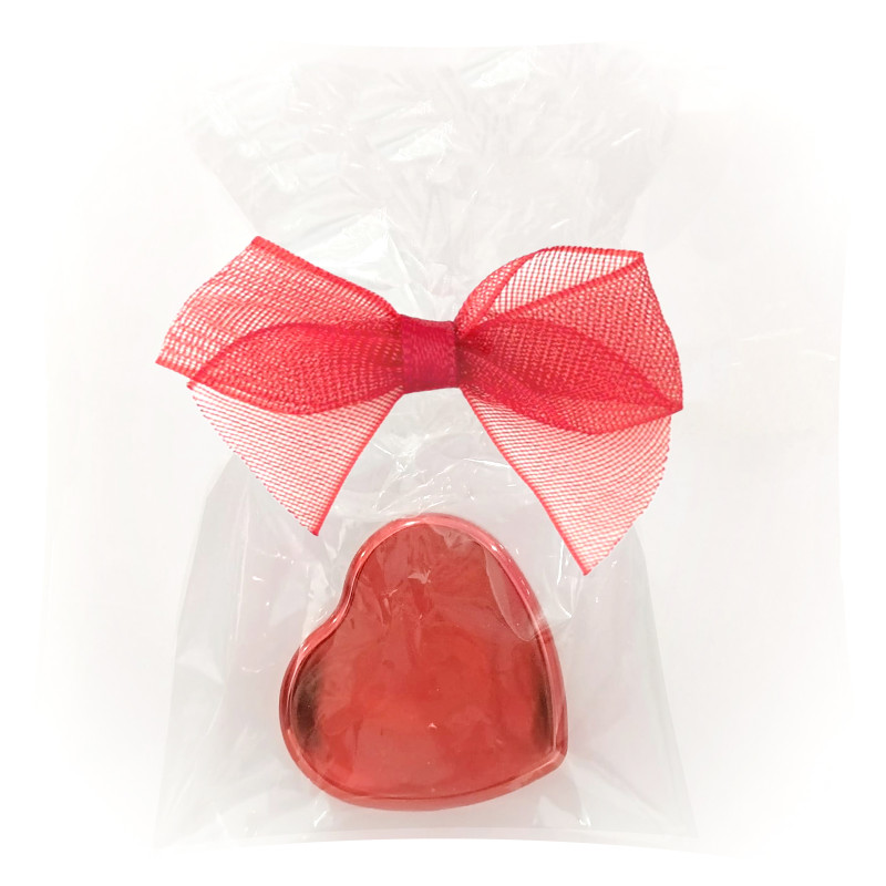 Pack de 40 gloss à lèvres en forme de coeur présenté dans un sachet cellophane et un nœud