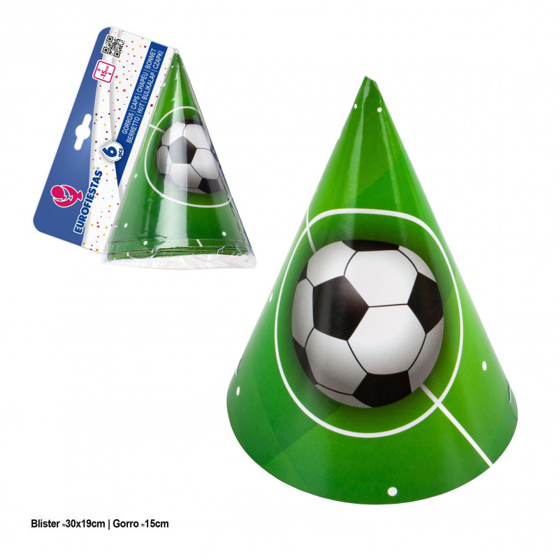 Chapeau de fête avec ballon de football sur l'herbe