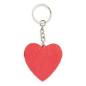 Poupée de chiffon dans un sac en tissu avec étiquette licorne personnalisée sur porte clés coeur