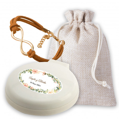 Miroir avec brosse et bracelet infini présenté dans un sac en tissu personnalisé