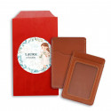 Porte-cartes marron dans un sac kraft avec autocollant communion fille personnalisé