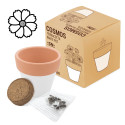 Pot en terre cuite avec des graines et bracelet en pierre volcanique comme cadeau