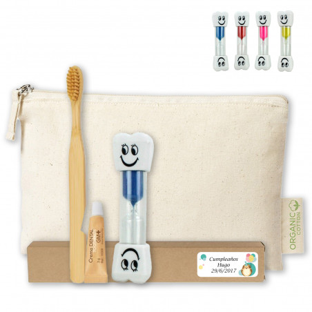 Brosse à dents en bambou avec dentifrice et sablier dans une pochette en coton