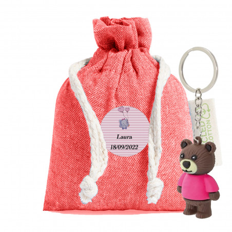 Porte-clés dans un sac en tissu avec un autocollant de baptême personnalisable pour une fille
