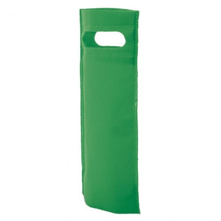 Vin personnalisé avec étiquette ronde de première communion enfant personnalisé présenté dans un sac vert