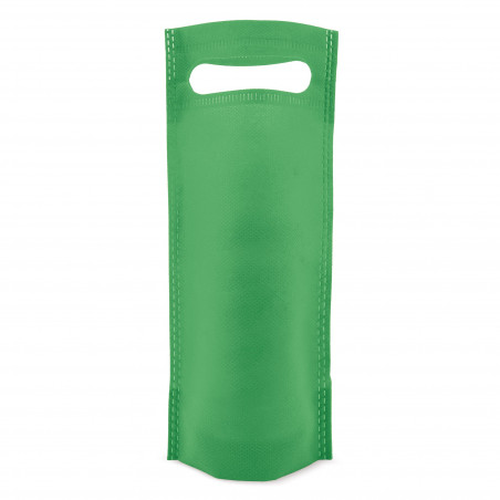 Vin personnalisé avec étiquette ronde de première communion enfant personnalisé présenté dans un sac vert
