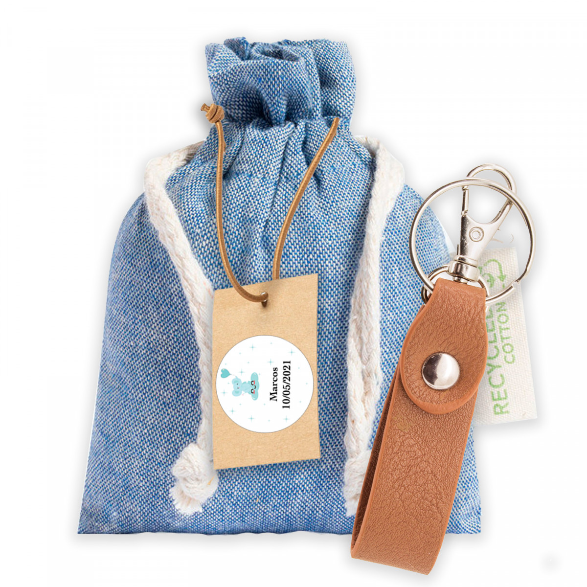 Porte-clés dans un sac en tissu avec une étiquette suspendue personnalisée pour les cadeaux de baptême