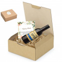 Bouteille de vin avec carte personnalisée dans un coffret de présentation