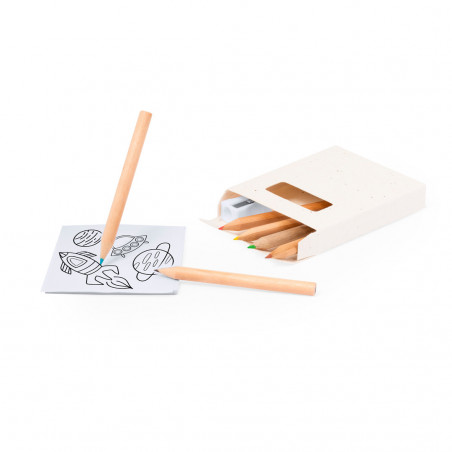 Bloc de dessin avec crayons de couleur et taille-crayon présenté dans une boîte avec des semences de fleurs pour des détails