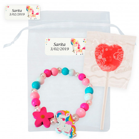 Bracelet licorne avec sucette dans un sac en organza personnalisé pour plus de détails