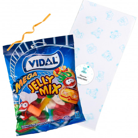 Un mélange d'oursons en gélatine dans un sachet avec un ours en peluche bleu, une fermeture dorée et un autocollant