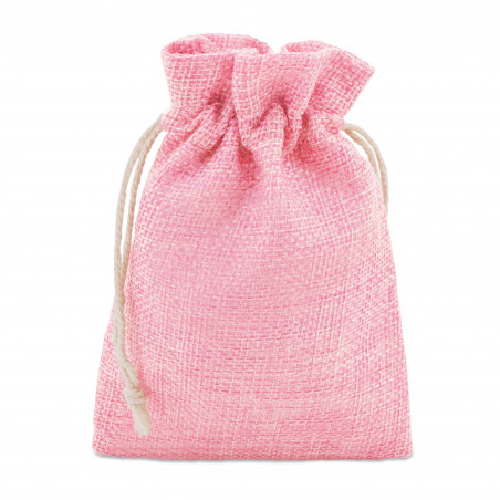 Stylo rouge à lèvres dans un sac en toile rose avec adhésif personnalisé pour les détails
