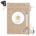Porte-clés avec charms métalliques avec sac en tissu et autocollant personnalisable pour les détails