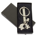 Porte-clés avec charms métalliques avec sac en tissu et autocollant personnalisable pour les détails