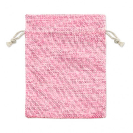 Bracelet avec perles et breloques colorées dans un sac en tissu rose et adhésif spécial pour le baptême