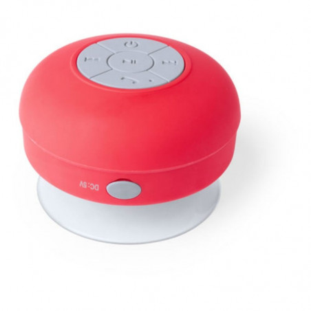 Enceinte Bluetooth étanche rouge avec autocollant spécial Noël représentant le Père Noël et ses amis