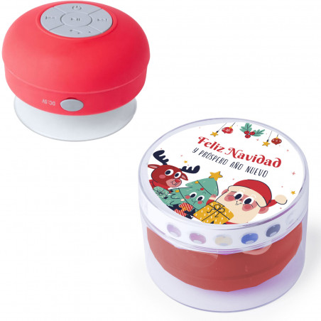 Enceinte Bluetooth étanche rouge avec autocollant spécial Noël représentant le Père Noël et ses amis