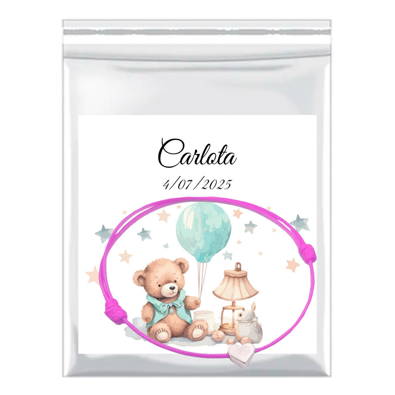 Bracelet coeur en fil rose avec carte de baptême personnalisée dans un sac de présentation