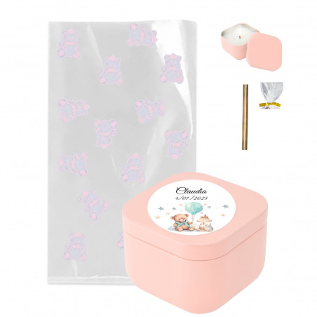 Bougie personnalisée dans un sac décoré d'ours en peluche roses et d'un fermoir doré pour les détails du baptême