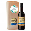 Vin rouge en sachet kraft personnalisé avec autocollant de Noël pour détails