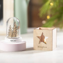 Bougie parfumée dans un pot en verre présentée dans une boîte en bois spéciale Noël