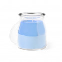 Bougie parfumée dans un pot en verre avec des odeurs et des couleurs variées