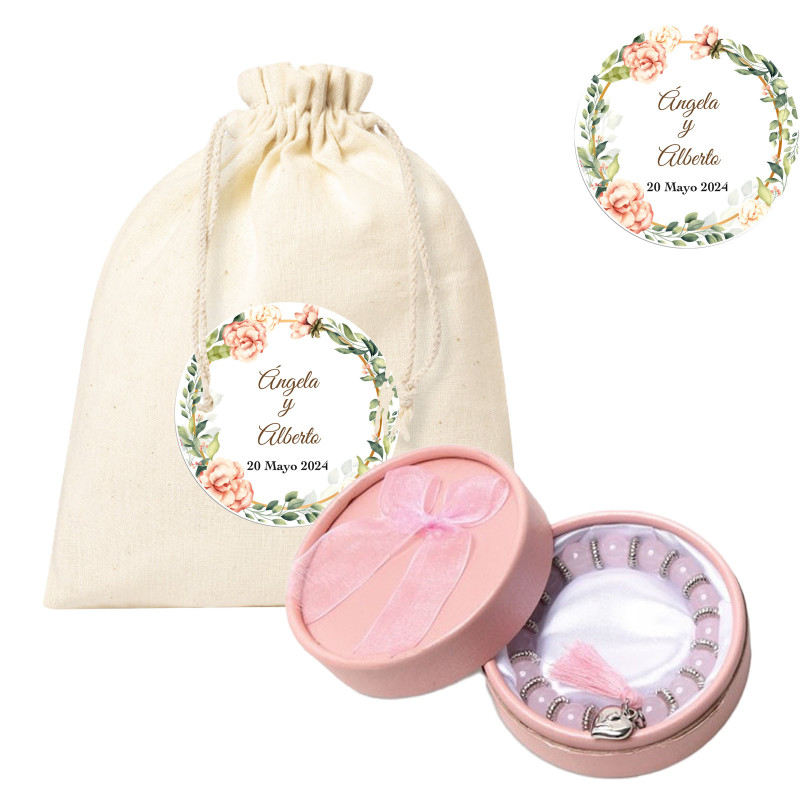 Bracelet rose en perles avec pompon dans un sac en coton et autocollant personnalisé pour les mariages